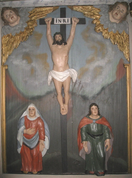 Jeesus ristil.  Saaremaa Jaani kiriku altarisein.